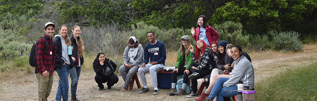 CSUMB and UCSC students work together at a field trip for elementary students.